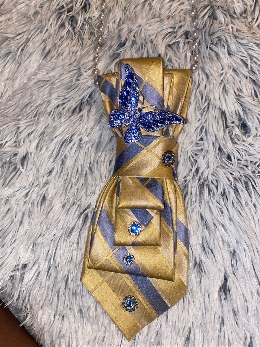 TIE BROOCHES